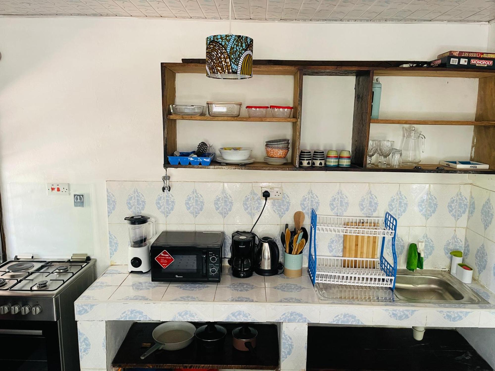 Savita House Diani Magutu Экстерьер фото
